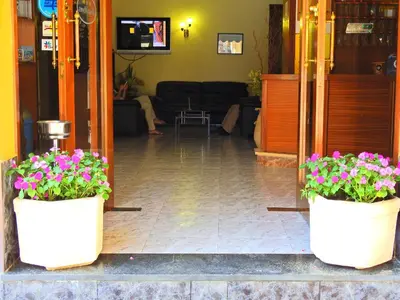 Una televisión o centro de entretenimiento en Hostal Bonavista