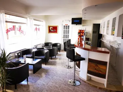 Una televisión o centro de entretenimiento en Hostal Bonavista