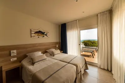 Cama o camas de una habitación en Hotel Tamariu