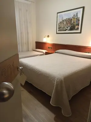 Cama o camas de una habitación en Hotel Europa