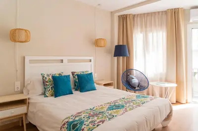 Cama o camas de una habitación en Hotel Aubí