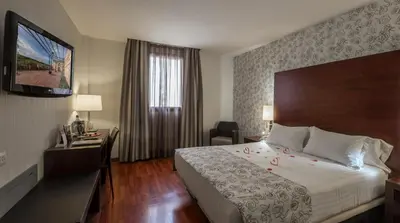 Cama o camas de una habitación en Hotel Gran Ultonia
