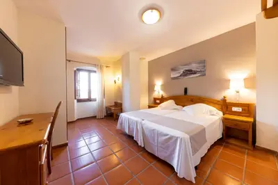 Cama o camas de una habitación en Mas Torrellas