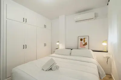 Cama o camas de una habitación en Apartamento con dos grandes terrazas en Girona