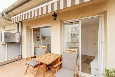 Una televisión o centro de entretenimiento en Apartamento con dos grandes terrazas en Girona
