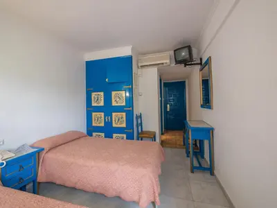 Cama o camas de una habitación en Checkin Garbí