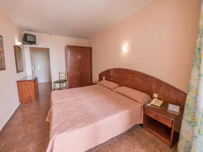 Cama o camas de una habitación en Checkin Garbí