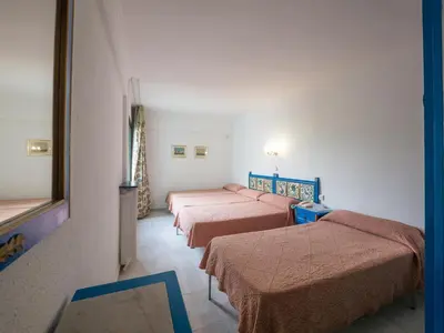 Cama o camas de una habitación en Checkin Garbí