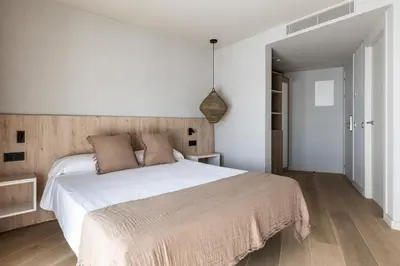 Cama o camas de una habitación en Hotel Casamar