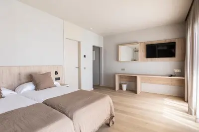 Cama o camas de una habitación en Hotel Casamar
