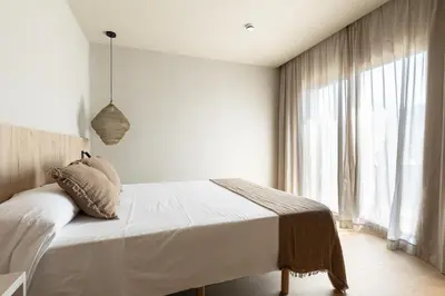 Cama o camas de una habitación en Hotel Casamar