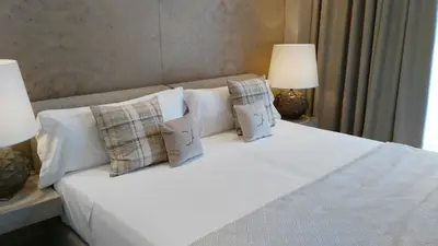 Cama o camas de una habitación en Cosmo Apartments Platja d'Aro