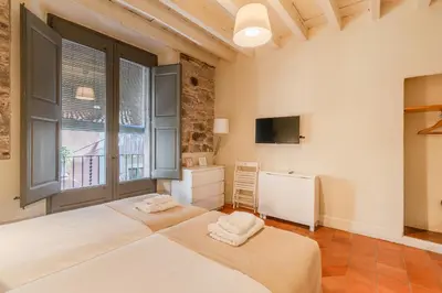 Cama o camas de una habitación en Flateli Ballesteries