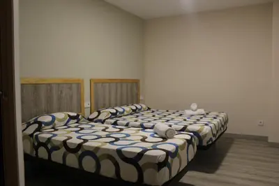 Cama o camas de una habitación en L'Hostalet d'Arenys de Mar