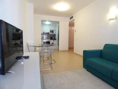 Una televisión o centro de entretenimiento en Apartamento Santa Fe