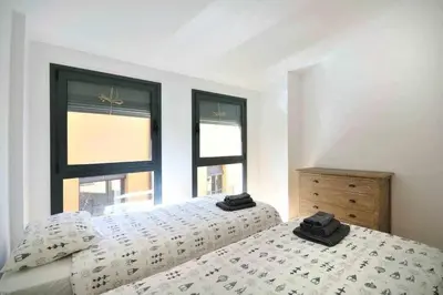 Cama o camas de una habitación en Stunning apartment w amazing views in Girona