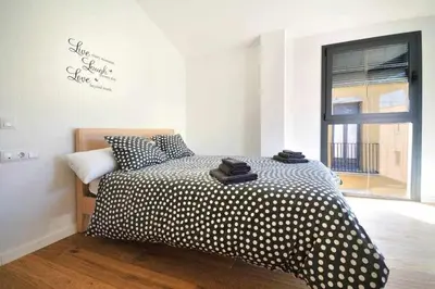Cama o camas de una habitación en Stunning apartment w amazing views in Girona