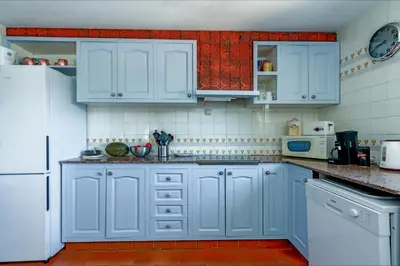 Una cocina o zona de cocina en Villa Natalia C101