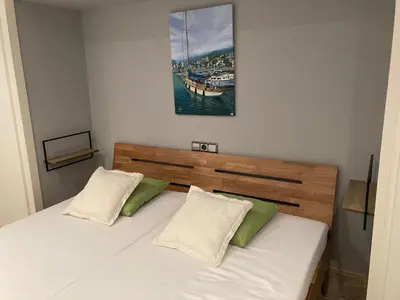 Cama o camas de una habitación en Villa Gardenia mit Pool und traumhaftem Meerblick
