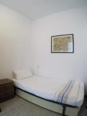 Cama o camas de una habitación en Aiguaneu Sa Palomera