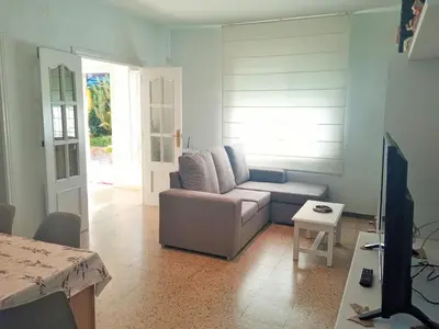 Una televisión o centro de entretenimiento en Villa Doris