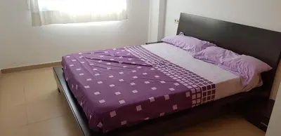 Cama o camas de una habitación en Santa Clotilde