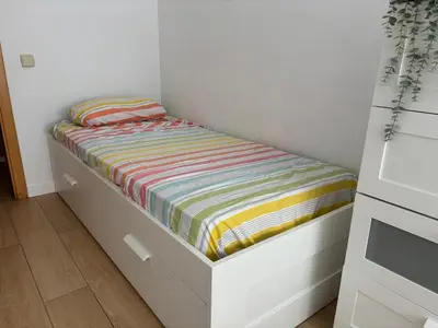 Cama o camas de una habitación en Santa Clotilde