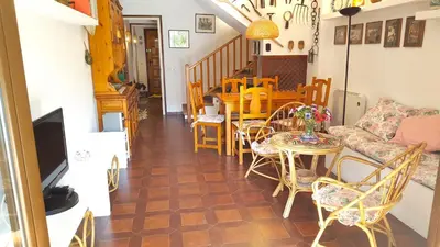 Una televisión o centro de entretenimiento en Villa Prat Xirlo
