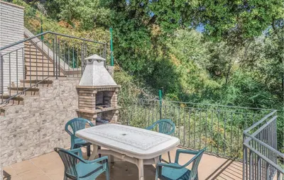 Un balcón o terraza de Nice Home In Santa Susanna With Kitchen