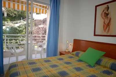 Cama o camas de una habitación en Lets Holidays BEACH APARTMENT 2 rooms with PARKING