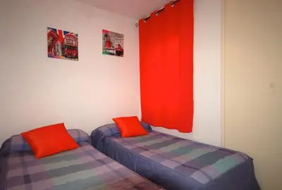 Cama o camas de una habitación en Lets Holidays BEACH APARTMENT 2 rooms with PARKING