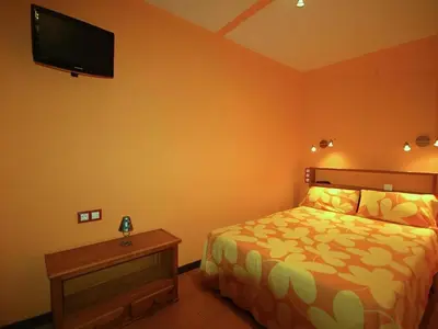 Cama o camas de una habitación en Lets Holidays POOL TERRACE APARTMENT TOSSA DE MAR