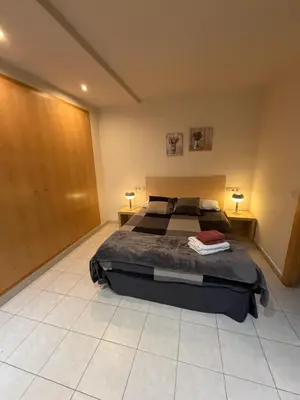 Cama o camas de una habitación en Apartamentos TDM