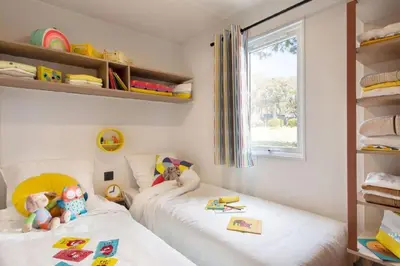 Cama o camas de una habitación en Camping Sènia Caballo de Mar