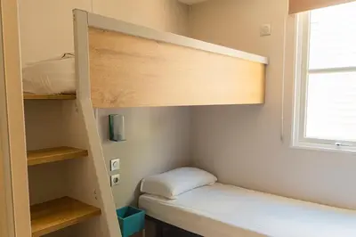 Cama o camas de una habitación en Camping Sènia Caballo de Mar