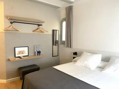 Cama o camas de una habitación en Calendula Hotel & Apartaments