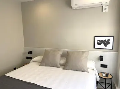 Cama o camas de una habitación en Calendula Hotel & Apartaments