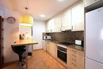 Una cocina o zona de cocina en Apartament Duplex Llaverias