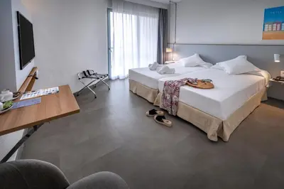 Cama o camas de una habitación en GHT S'Agaró Mar Hotel