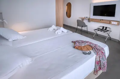 Cama o camas de una habitación en GHT S'Agaró Mar Hotel