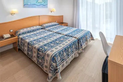 Cama o camas de una habitación en GHT Xaloc