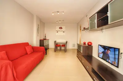 Una televisión o centro de entretenimiento en Apartamento ADIA