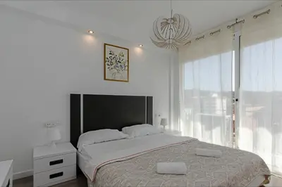 Cama o camas de una habitación en Apartamento Seven Seas