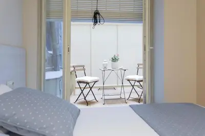 Cama o camas de una habitación en Bravissimo Cort Reial-1B