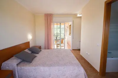 Cama o camas de una habitación en Catalunya Casas Tranquil Costa Brava Retreat with private suite!