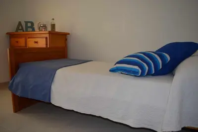 Cama o camas de una habitación en Miquel 1 – Piso con Parking y Wifi en el Centro
