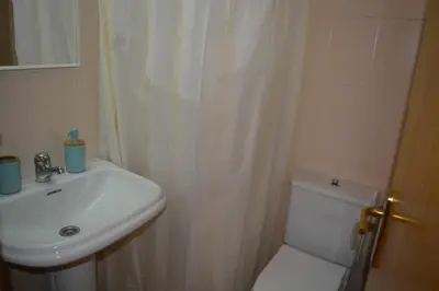 Un baño de Miquel 1 – Piso con Parking y Wifi en el Centro