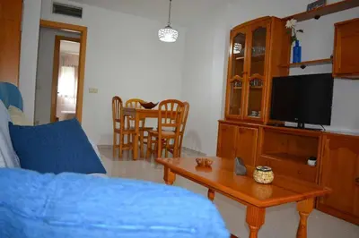 Una televisión o centro de entretenimiento en Miquel 1 – Piso con Parking y Wifi en el Centro