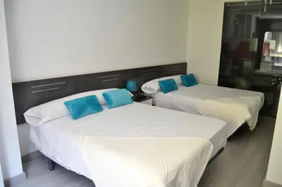 Cama o camas de una habitación en Bed&Breakfast 10 GIRONA
