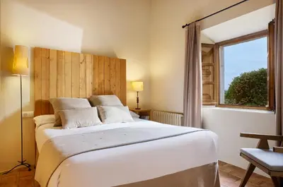 Cama o camas de una habitación en Turismo Rural Mas Ametller